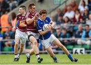 28 June 2014; Robert Maloney Derham, Cavan, in action against Kieran Martin, Westmeath. GAA Football All Ireland Senior Championship, Round 1B, Cavan v Westmeath, Kingspan Breffni Park, Cavan. Photo by Sportsfile