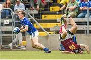 28 June 2014; Martin Reilly, Cavan, in action against Lorcan Smyth, Westmeath. GAA Football All Ireland Senior Championship, Round 1B, Cavan v Westmeath, Kingspan Breffni Park, Cavan. Photo by Sportsfile