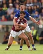 28 June 2014; Paul Sharry, Westmeath, in action against Killian Brady, Cavan. GAA Football All Ireland Senior Championship, Round 1B, Cavan v Westmeath, Kingspan Breffni Park, Cavan. Photo by Sportsfile