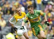 9 July 2006; Declan Walsh, Donegal, in action against Brian Neeson, Antrim. ESB Ulster Minor Football Championship Final, Donegal v Antrim, Croke Park, Dublin. Picture credit: Ray McManus / SPORTSFILE