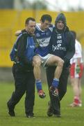8 July 2006; Padraig McMahon, Laois, is helped from the pitch by Laois medical staff. Bank of Ireland All-Ireland Senior Football Championship Qualifier, Round 2, Laois v Tyrone, O'Moore Park, Portlaoise, Co. Laois. Picture credit: Brendan Moran / SPORTSFILE