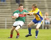 16 July 2006; Pierce Hanley, Mayo, in action against David Keenan, Roscommon. ESB Connacht Minor Football Championship Final, Mayo v Roscommon, McHale Park, Castlebar, Co. Mayo. Picture credit: Pat Murphy / SPORTSFILE
