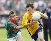 16 July 2006; Conor Devaney, Roscommon, in action against Anthony Murray, Mayo. ESB Connacht Minor Football Championship Final, Mayo v Roscommon, McHale Park, Castlebar, Co. Mayo. Picture credit: Damien Eagers / SPORTSFILE