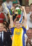 16 July 2006; David Flynn, Roscommon, lifts the Kilcoyne Cup. ESB Connacht Minor Football Championship Final, Mayo v Roscommon, McHale Park, Castlebar, Co. Mayo. Picture credit: Pat Murphy / SPORTSFILE