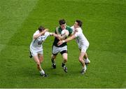 29 June 2014: Donncha Tobin, Meath, in action against Cathal McNally, left, and Eamonn O'Callaghan, Kildare. Leinster GAA Football Senior Championship Semi-Final, Kildare v Meath, Croke Park, Dublin. Picture credit: Dáire Brennan / SPORTSFILE