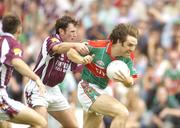 16 July 2006; Billy Joe Padden, Mayo, in action against Diarmuid Blake, Galway. Bank of Ireland Connacht Senior Football Championship Final, Mayo v Galway, McHale Park, Castlebar, Co. Mayo. Picture credit: Pat Murphy / SPORTSFILE