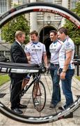 2 July 2014; An Taoiseach Enda Kenny TD, with rugby legends and brothers, from left, Paul, David and Richard Wallace at Government Buildings to promote the Viviscal CROSS Rugby Legends Cycle which takes place from 6-12 September 2014 from Mizen to Malin, to raise funds for cancer research. A limited number of stage places remain on the cycle so to register visit www.crossrugbylegends.com   The aim of the Legends Cycle is to raise cancer awareness throughout Ireland, with a special emphasis on cancer education and awareness within the youth community.  Supporting CROSS (Cancer Research) and the work of Professor John Reynolds and his teams in St. James’s Hospital and Trinity College, Dublin, the Friends of CROSS are also committed to raising funds for the purpose of Cancer Research, Prevention and Treatment. Government Buildings, Merrion Square, Dublin. Picture credit: Brendan Moran / SPORTSFILE