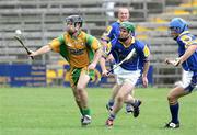 30 July 2006; Niall Campbell, Donegal, in action against Damien Corcoran, Longford. Nicky Rackard Cup semi-final, Longford v Donegal, Brewster Park, Enniskillen, Co. Fermanagh. Picture credit; Oliver McVeigh / SPORTSFILE
