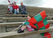 30 July 2006; 4 year old Ciara Mulkerrin, from Castlebar, Co. Mayo, watches the final minutes of the game. TG4 Ladies Connacht Senior Football Final, Mayo v Galway, McHale Park, Castlebar, Co. Mayo. Picture credit; Ray Ryan / SPORTSFILE