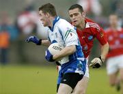 4 August 2006; Keith Sheerin, Monaghan, is tackled by Shane Lennon, Louth. Tommy Murphy Cup Quarter-Final, Louth v Monaghan, St. Brigid's Park, Dowdallshill, Dundalk, Co. Louth. Picture credit; Matt Browne / SPORTSFILE