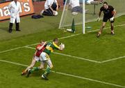 5 August 2006; Kieran Donaghy, Kerry, goes past Francis Bellew, Armagh, before shooting past the goalkeeper Paul Hearty to score  his side's second goal, Bank of Ireland All-Ireland Senior Football Championship Quarter-Final, Armagh v Kerry, Croke Park, Dublin. Picture credit; Ray McManus / SPORTSFILE