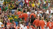 5 August 2006; Kerry supporters celebrate at the end of the game as Armagh supporters head out of the stadium. Bank of Ireland All-Ireland Senior Football Championship Quarter-Final, Armagh v Kerry, Croke Park, Dublin. Picture credit; David Maher / SPORTSFILE