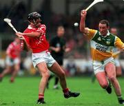 8 August 1999; Brian Corcoran of Cork in action against John Ryan of Offaly during the Guinness All-Ireland Hurling Senior Championship Semi-Final match between Cork and Offaly at Croke Park in Dublin. Photo by Brendan Moran/Sportsfile
