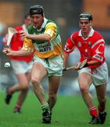 8 August 1999; Brian Whelahan of Offaly in action against Neil Ronan of Cork during the Guinness All-Ireland Hurling Senior Championship Semi-Final match between Cork and Offaly at Croke Park in Dublin. Photo by Aoife Rice/Sportsfile
