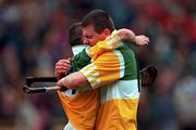 8 August 1999; Diarmuid O'Sullivan, Cork, right and teammate Sean McGrath, wearing their opponents jersey, celebrate victory at the final whistle during the GAA Hurling All-Ireland Senior Championship Semi-Final match between Cork and Offaly at Croke Park in Dublin. Photo by Ray McManus/Sportsfile