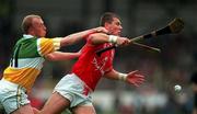 8 August 1999; Diarmuid O'Sullivan of Cork is tackled by  John Troy of Offaly during the Guinness All-Ireland Hurling Senior Championship Semi-Final match between Cork and Offaly at Croke Park in Dublin. Photo by Brendan Moran/Sportsfile