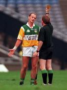 8 August 1999;  Referee Dickie Murphy gives a yellow card to Joe Dooley of Offaly during the Guinness All-Ireland Hurling Senior Championship Semi-Final match between Cork and Offaly at Croke Park in Dublin. Photo by Aoife Rice/Sportsfile