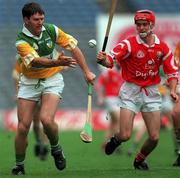 8 August 1999 Martin Hanamy of Offaly in action against Sean McGrath of Cork during the Guinness All-Ireland Hurling Senior Championship Semi-Final match between Cork and Offaly at Croke Park in Dublin. Photo by Ray McManus/Sportsfile