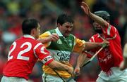 8 August 1999; Martin Hanamy of Offaly is tackled by Alan Browne, 22, and Ben O'Connor of Cork during the Guinness All-Ireland Hurling Senior Championship Semi-Final match between Cork and Offaly at Croke Park in Dublin. Photo by Brendan Moran/Sportsfile