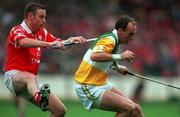 8 August 1999; Joe Dooley of Offaly in action against Fergal Ryan of Cork during the Guinness All-Ireland Hurling Senior Championship Semi-Final match between Cork and Offaly at Croke Park in Dublin. Photo by Brendan Moran/Sportsfile