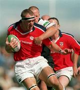 14 August 1999; John Langford of Munster is tackled by Mel Deane of Connacht during the Guinness Interprovincial Championship match between Connacht and Munster at the Sportsgrounds in Galway. Photo by Brendan Moran/Sportsfile