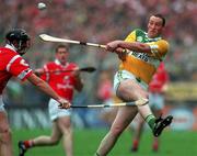 8 August 1999; John Ryan of Offaly in action against Brian Corcoran of Cork during the Guinness All-Ireland Hurling Senior Championship Semi-Final match between Cork and Offaly at Croke Park in Dublin. Photo by Ray McManus/Sportsfile