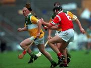 8 August 1999; John Troy of Offaly in action against Brian Corcoran of Cork during the Guinness All-Ireland Hurling Senior Championship Semi-Final match between Cork and Offaly at Croke Park in Dublin. Photo by Aoife Rice/Sportsfile