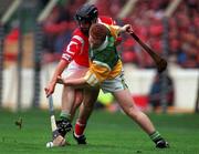8 August 1999; Simon Whelahan of Offaly in action against Ben O'Connor of Cork during the Guinness All-Ireland Hurling Senior Championship Semi-Final match between Cork and Offaly at Croke Park in Dublin. Photo by Aoife Rice/Sportsfile