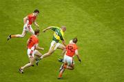 5 August 2006; Sean O'Sullivan, Kerry, with Armagh players Malachy Macklin, 12, Paul McGrane, 9, and Andy Mallon in persuit. Bank of Ireland All-Ireland Senior Football Championship Quarter-Final, Armagh v Kerry, Croke Park, Dublin. Picture credit; Ray McManus / SPORTSFILE