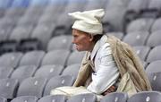 6 August 2006; A Cork supporter watches the match. ESB All-Ireland Minor Hurling Championship Semi-Final, Cork v Galway, Croke Park, Dublin. Picture credit; Damien Eagers / SPORTSFILE