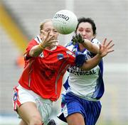 6 August 2006; Maria O'Donnell, Armagh, in action against Christina Reilly, Monaghan. TG4 Ladies Ulster Senior Football Final, Monaghan v Armagh, St Tighearnach's Park, Clones, Co. Monaghan. Picture credit; Oliver McVeigh / SPORTSFILE