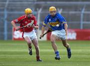 9 August 2006; James Woodlock, Tipperary, in action against Cathal Naughton, Cork. Erin U21 Munster Hurling Final, Tipperary v Cork, Semple Stadium, Thurles, Co. Tipperary. Picture credit; Damien Eagers / SPORTSFILE