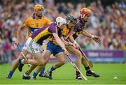 12 July 2014; Liam Ryan and Andrew Shore, right, Wexford, in action against Peter Duggan, left, and Colin Ryan, Clare. GAA Hurling All-Ireland Senior Championship Round 1 Replay, Clare v Wexford, Wexford Park, Wexford. Picture credit: Dáire Brennan / SPORTSFILE