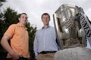 8 August 2006; Kilkenny's Eoin Larkin, left, and Clare's Niall Gilligan with the Liam MacCarthy Cup at a photocall ahead of next Sunday's Guinness All-Ireland Hurling semi-final between Kilkenny and Clare in Croke Park. Grand Canal, Dublin. Picture credit; Brian Lawless / SPORTSFILE