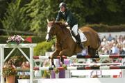 11 August 2006; Cameron Hanley, aboard Siec Hippica Kerman, in action during the Samsung Super League with FEI of Ireland for Award of the Aga Khan Trophy in association with Failte Ireland. Failte Ireland Dublin Horse Show, RDS Main Arena, RDS, Dublin. Picture credit; Matt Browne / SPORTSFILE