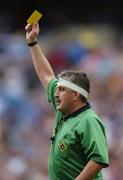 12 August 2006; Referee Brian Crowe issues a yellow card. Bank of Ireland All-Ireland Senior Football Championship, Quarter-Final, Dublin v Westmeath, Croke Park, Dublin. Picture credit; Damien Eagers / SPORTSFILE