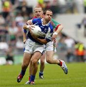 13 August 2006; Tom Kelly, Laois, in action against Ger Brady, Mayo. Bank of Ireland All-Ireland Senior Football Championship Quarter-Final, Mayo v Laois, Croke Park, Dublin. Picture credit; Damien Eagers / SPORTSFILE