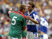 13 August 2006; Noel Garvan, Laois, and David Heaney, Mayo, after the final whistle. Bank of Ireland All-Ireland Senior Football Championship Quarter-Final, Mayo v Laois, Croke Park, Dublin. Picture credit; Matt Browne  / SPORTSFILE