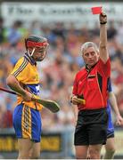 12 July 2014; Match referee Johnny Ryan shows Jack Browne, Clare, the red card. GAA Hurling All-Ireland Senior Championship Round 1 Replay, Clare v Wexford, Wexford Park, Wexford. Picture credit: Dáire Brennan / SPORTSFILE