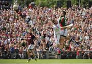 13 July 2014; Barry Moran, Mayo,palms the ball over Galway goalkeeper Manus Breathnach to score his side's third goal. Connacht GAA Football Senior Championship Final, Mayo v Galway, Elverys MacHale Park, Castlebar, Co. Mayo. Picture credit: Tomás Greally / SPORTSFILE