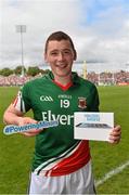 13 July 2014; Electric Ireland, proud sponsor of the GAA minor championships presented  Minor footballer with their #PoweringMinors Award. Electric Ireland are awarding iPads to current minor players who have reached the provincial final stages of the 2014 campaign. Players on Minor football and hurling panels have nominated one player on their team who they feel has stood out from everyone in terms of performance and attitude throughout this year’s campaign. The #PoweringMinors award demonstrates Electric Irelands’ commitment to the futures of current minor players. Pictured with his award is Mayo's Conor Burke.  Electric Ireland GAA Football Minor Championship Final, Mayo v Roscommon, Elverys MacHale Park, Castlebar, Co. Mayo. Picture credit: David Maher / SPORTSFILE