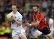 13 July 2014; Ollie Lyons, Kildare, in action against Conor Laverty, Down. GAA Football All-Ireland Senior Championship Round 2B, Down v Kildare, Páirc Esler, Newry, Co. Down. Picture credit: Piaras Ó Mídheach / SPORTSFILE