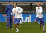 15 August 2006; Dutch coach Marco Van Basten watches his players Arjen Robben and Dirk Kuyt, right, in action during Netherlands squad training. Lansdowne Road, Dublin. Picture credit; Damien Eagers / SPORTSFILE