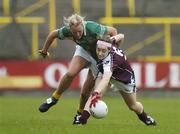 19 August 2006; Caitriona Cormican, Galway, in action against Mary Sheridan, Meath. TG4 Ladies All-Ireland Senior Football Championship Quarter-Final, Galway v Meath, O'Moore Park, Portlaoise, Co. Laois. Picture credit: Brendan Moran / SPORTSFILE