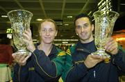 15 August 2006; Paul Brady, Cavan, winner of the Men's Open Singles, with Fiona Shannon, St. Paul's Club, Belfast, winner of the Ladies Open Singles, members of the Irish handball team, on the team's arrival home from the 2006 World Handball Championships, which took place in Edmonton, Canada. Dublin Airport, Dublin. Picture credit: Brian Lawless / SPORTSFILE