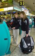 16 August 2006; Irish rowers Sinead Jennings and Niamh Ni Cheilleachair check in at Dublin Airport ahead of the Irish Rowing team's departure to the World Rowing Championships to be held from the 20th to the 27th August in London, England. Dublin Airport, Dublin. Picture credit: Brendan Moran / SPORTSFILE
