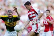20 August 2006; Alan Quirke, Cork, in action against Mike Frank Russell, Kerry. Bank of Ireland All-Ireland Senior Football Championship Semi-Final, Kerry v Cork, Croke Park, Dublin. Picture credit: Brian Lawless / SPORTSFILE