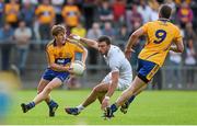 19 July 2014; Pádraic Collins, Clare, in action against Fergal Conway, Kildare. GAA Football All Ireland Senior Championship, Round 3B, Clare v Kildare, Cusack Park, Ennis, Co. Clare. Picture credit: Diarmuid Greene / SPORTSFILE