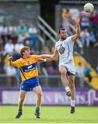 19 July 2014; Fergal Conway, Kildare, in action against Pádraic Collins, Clare. GAA Football All Ireland Senior Championship, Round 3B, Clare v Kildare, Cusack Park, Ennis, Co. Clare. Picture credit: Diarmuid Greene / SPORTSFILE