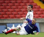 19 August 2006; Peter Thompson, Linfield, in action against Gary Spence, Lisburn Distillery. CIS Insurance Cup, Linfield v Lisburn Distillery, Windsor Park, Belfast, Co. Antrim. Picture credit: Oliver McVeigh / SPORTSFILE